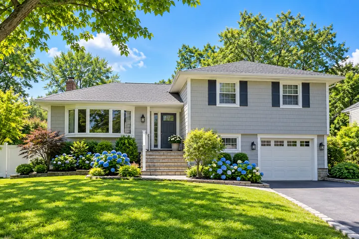 Illustrative sunlit Long Island home with hydrangeas